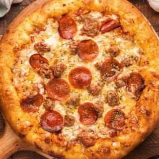 Pizza quatre saisons meduim