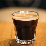 Café allongé +boissons d'eau 33cl