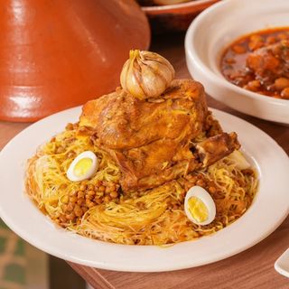 Rfissa poulet sur lit de rziza