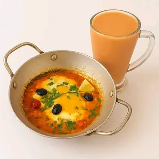 Mkila omelette tomates +jus de panaché