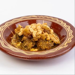 Viande aux abricots , ananas et noix de cajou