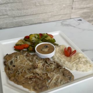 Emincé de poulet champignons