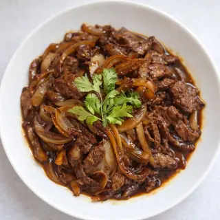Bœuf aux oignons
