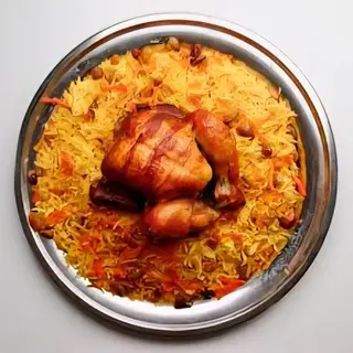 دجاجة كامله مع الارز البسمتي