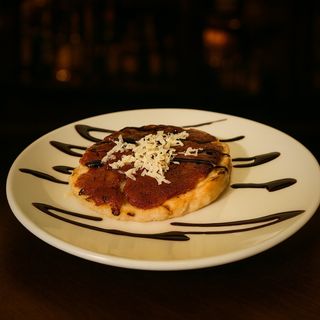 TARTE À LA TOMATE CONFITE