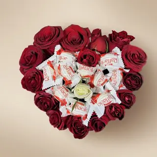 Boîte des roses rouge et chocolat rafaello