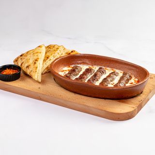 Ćevapi u kajmak sosu 5 kom