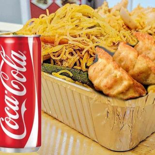 STIR FRIED VERMICELLI ( GLASS NOODLES) WITH 3 PCS GYOZA AND 1 COCA COLA