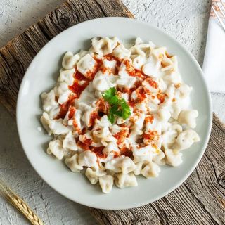 Homemade (Mantı) dumplings served with yogurt