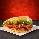 Chicken Doner/Tavuk Doner/Chicken Doner - in half a bread