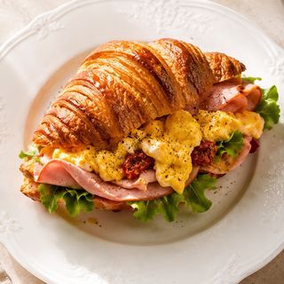 Croissant omelette mortadella sun-dried tomato salad
