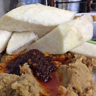 Beans and yam with meat and ponmo