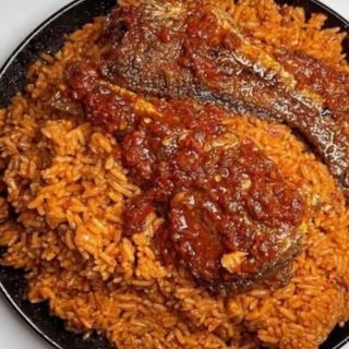 Jollof Rice + either 2Goat Meat or 2beef 