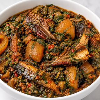 Efo Riro With Kpomo And Smoked Fish