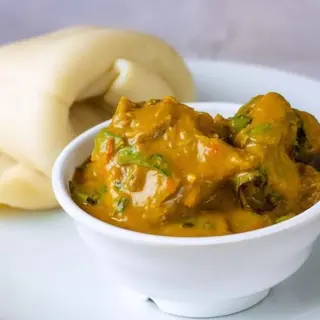 1 plate of Bitterleaf Soup Mixed with Ogbonno With Swallow And Protein