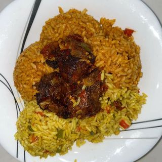 JOLLOF RICE AND FRIED RICE WITH CHICKEN 