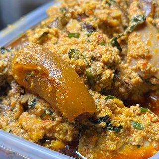 Gimme Egusi (Fried Fish, Kpomo, Beef)