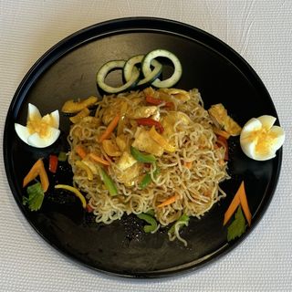 Noodles and fried eggs
