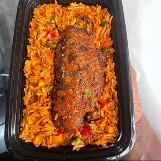 Jollof rice served with Turkey