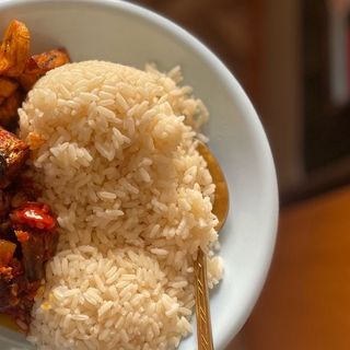 White rice stew plantain and beef 
