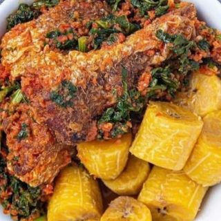 Boiled plantain with vegetable and Titus Fish