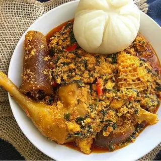 Delicious Poundo-Yam with Egusi Soup & Chicken , Kpomo with Asorted