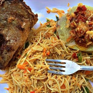 Tasty Garnish Spaghetti with croaker fish