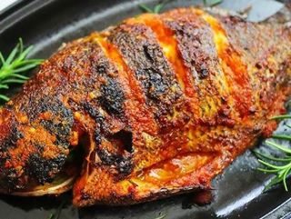 Cut grilled fish tail