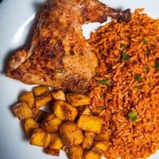 Jollof Rice With Plantain And Big Chicken
