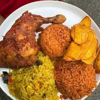 Jollof with Fried Rice And Plantain with Big Chicken