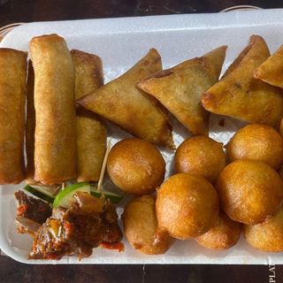 3 spicy beef with 4 samosa and 4 spring rolls 10 puff puff