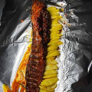 Grilled Cat Fish With Chips And Sauce.