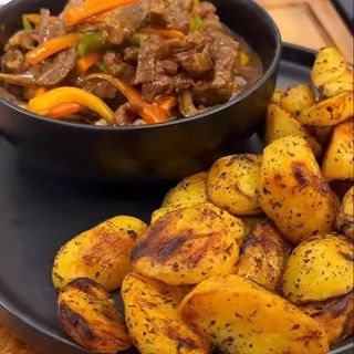 Spicy grilled Irish potatoes with shredded beef sauce