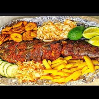 Barbecue catfish with fried sweet potatoes chips and fried plantains 