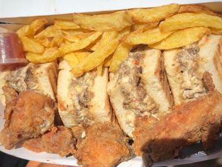 Beef sandwich crispy wings and chips