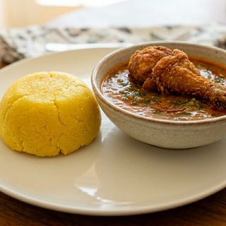 One Rap of eba with Ogbono and fried chicken