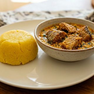 One Rap of eba with Egusi soup and fried fish