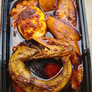 Ewa Agoyin with fish and plantain