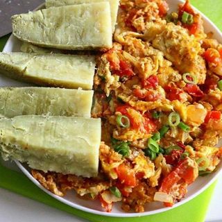 Boiled yam with egg sauce with fish