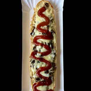 Zapiekanka z szynką i pieczarkami