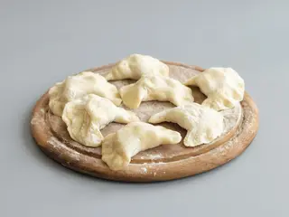 Pierogi Włoskie w sosie 8szt
