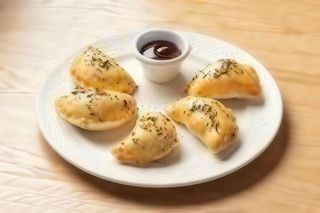 Pierogi pieczone z kapustą i grzybami 5 szt