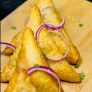 Afrykańskie pierogi z ziemniakami