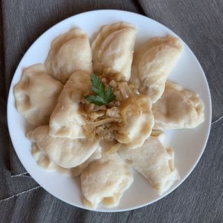 Pierogi z kapustą i pieczarkami