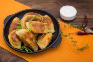 Pierogi smażone z kapustą i pieczarkami 9 szt