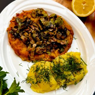 Schab zapiekany z pieczarkami i boczkiem