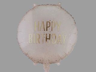 Kremowy balon urodzinowy
