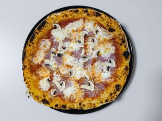 Prosciutto e funghi