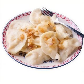 Pierogi z ziemniakami i smażoną cebulą