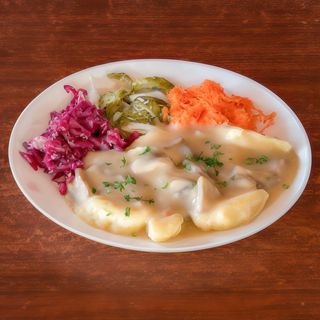 Kopytka z sosem pieczarkowym